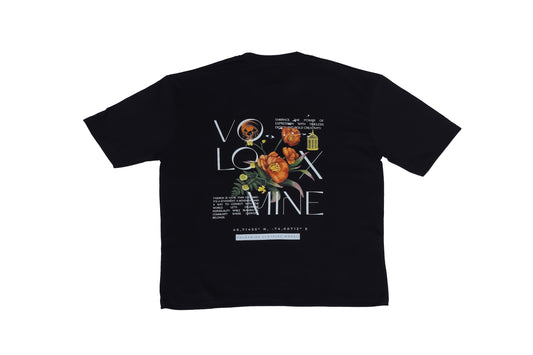 Black Voloxmine t-shirt featuring an intricate floral design with orange blooms and modern typography text on a white background, perfect for streetwear fashion.