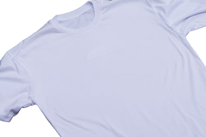 A white oversized T-shirt with a logo on the chest, displayed against a white background